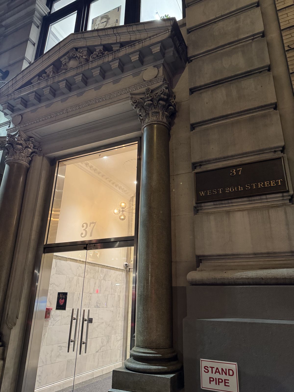 The entrance of 37 West 26th Street, the building where Silq Skin Aesthetics is located